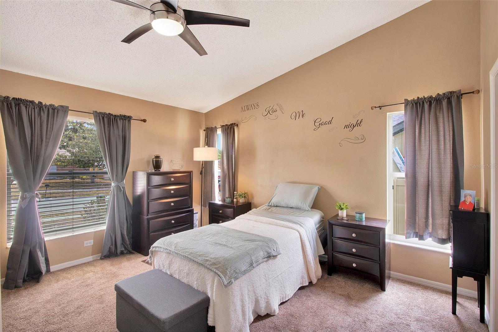 Primary bedroom with walk-in closet and en-suite bathroom