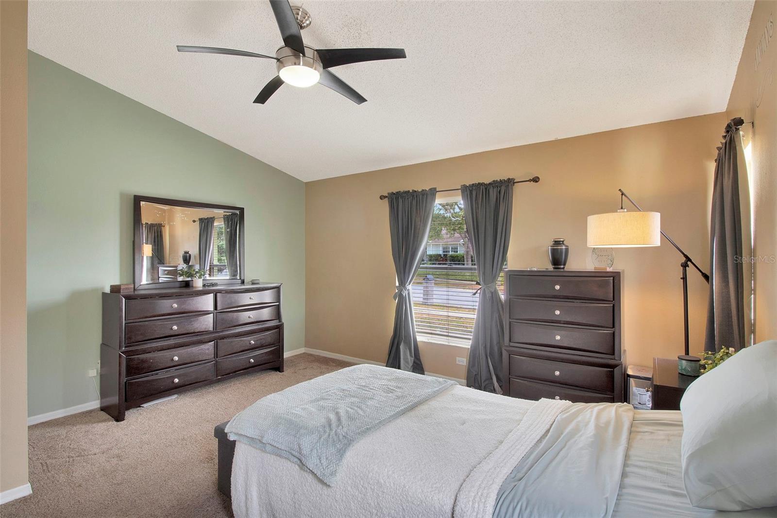 Primary bedroom with walk-in closet and en-suite bathroom