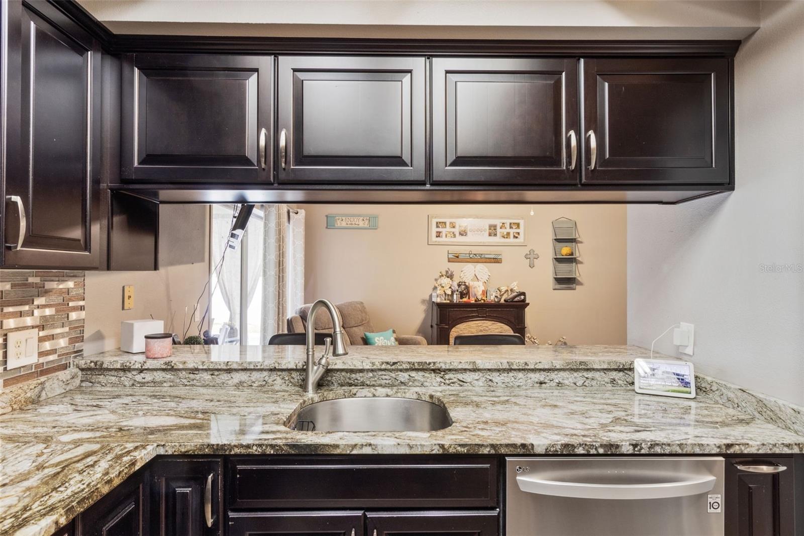 Kitchen/ Family room combo with eat-in breakfast bar