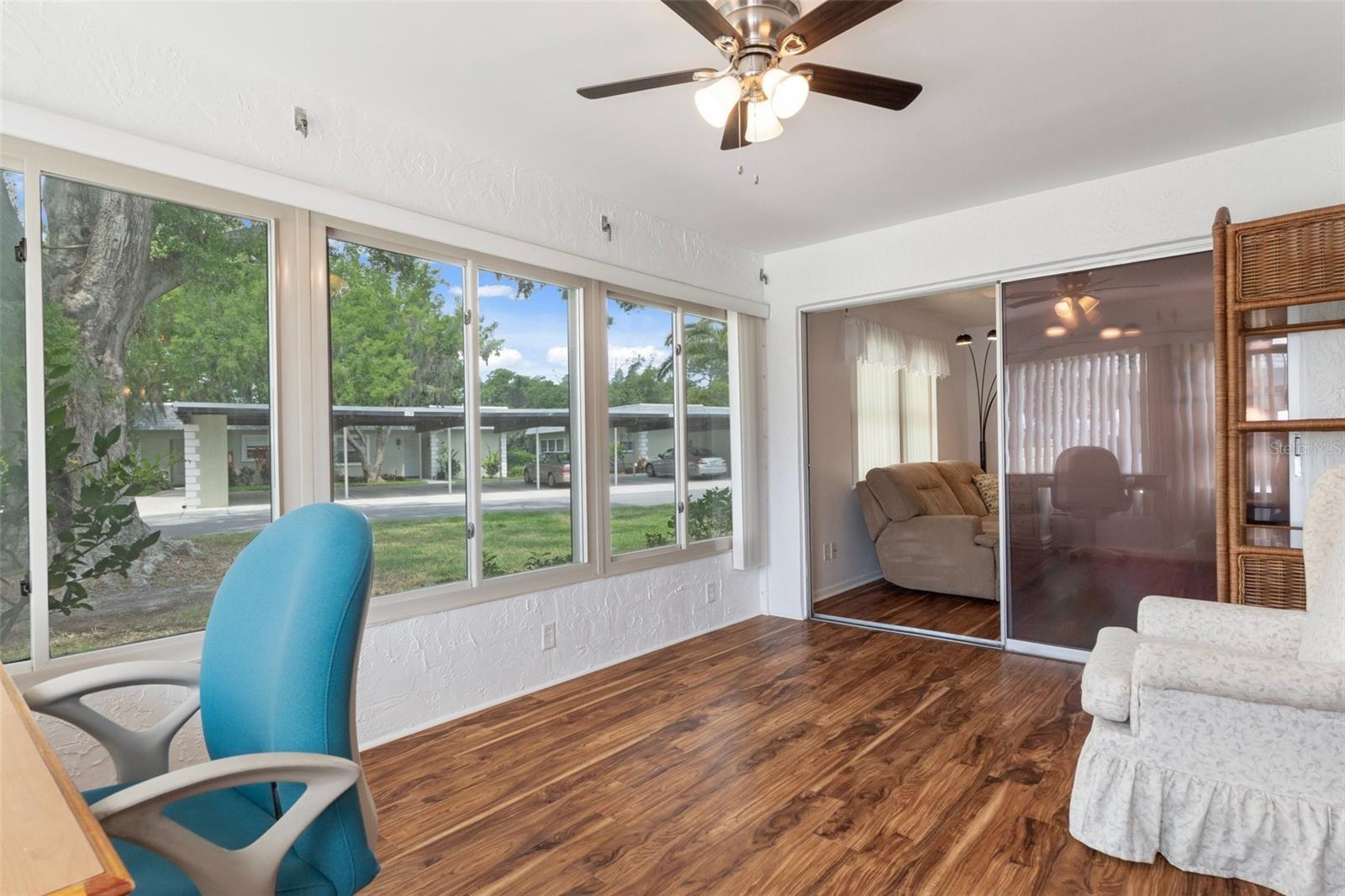 Florida/Versatile Room with Laminate Flooring and Windows