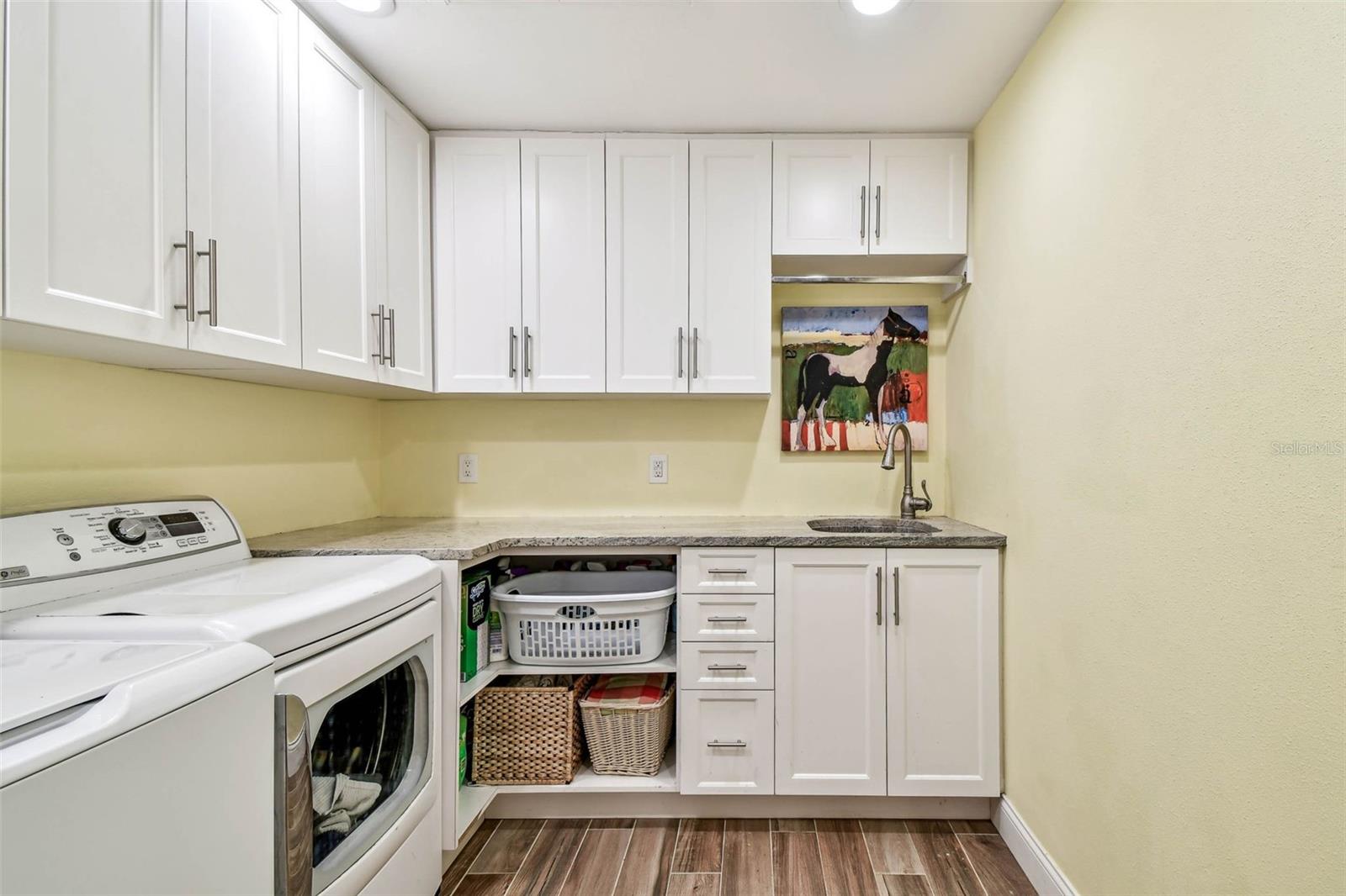 Laundry Room Complete with Sink and Extra Storage