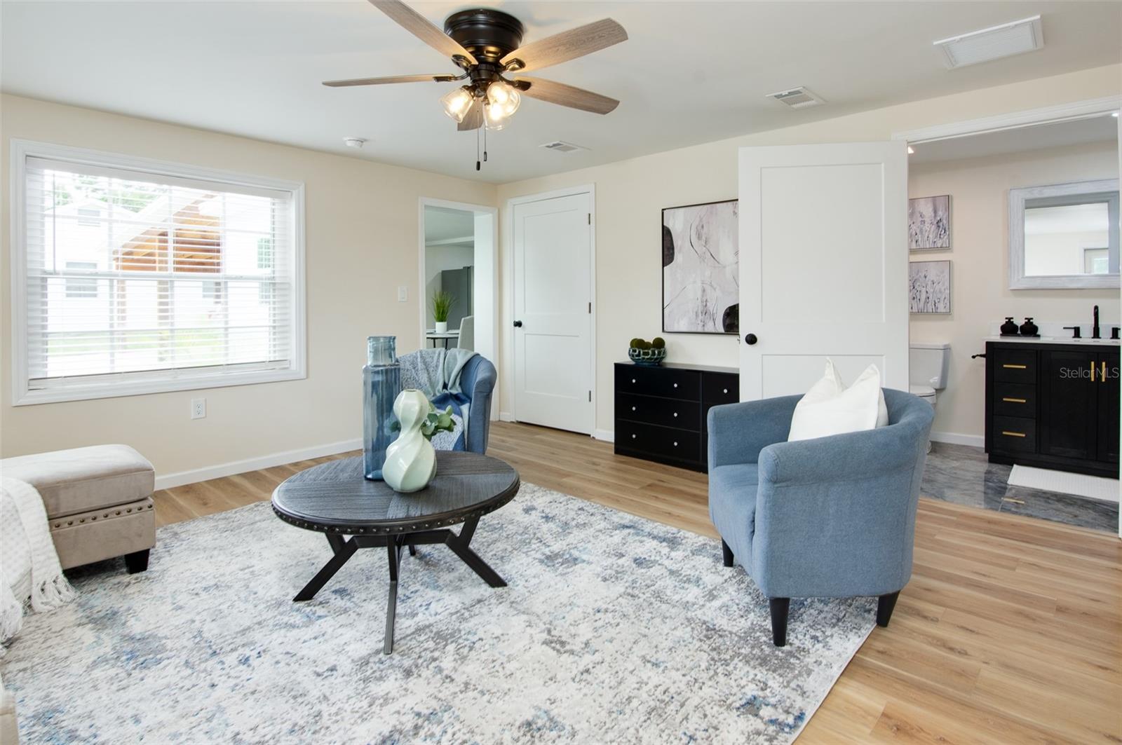Living Room and view of bathroom