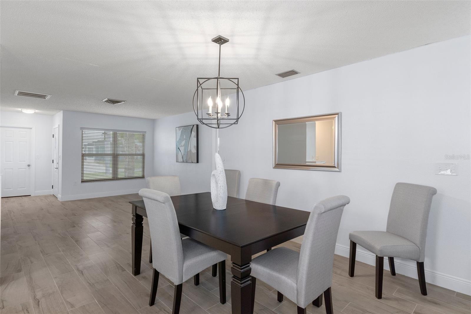 Dining Area with NEW Lighting and NEW Wood Look Plank Tile