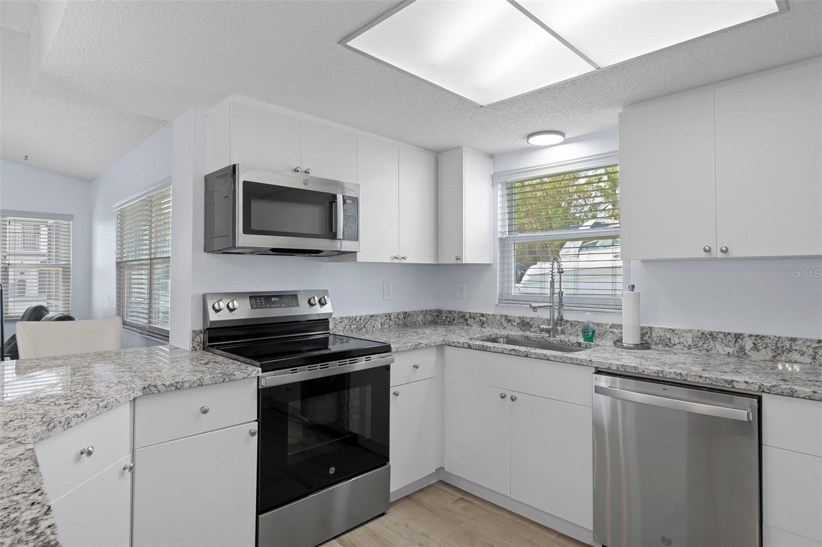 Kitchen with NEW Stainless Steel Appliances