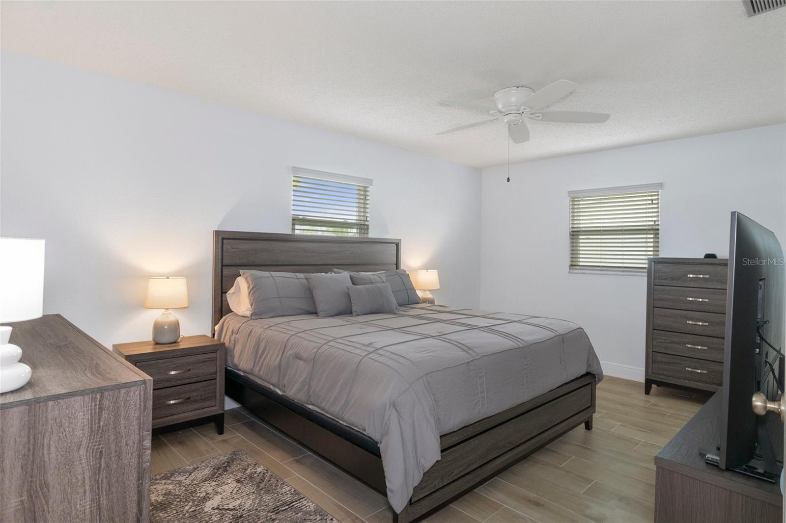 Bedroom 1with NEW Wood Look Tile Plank Flooring