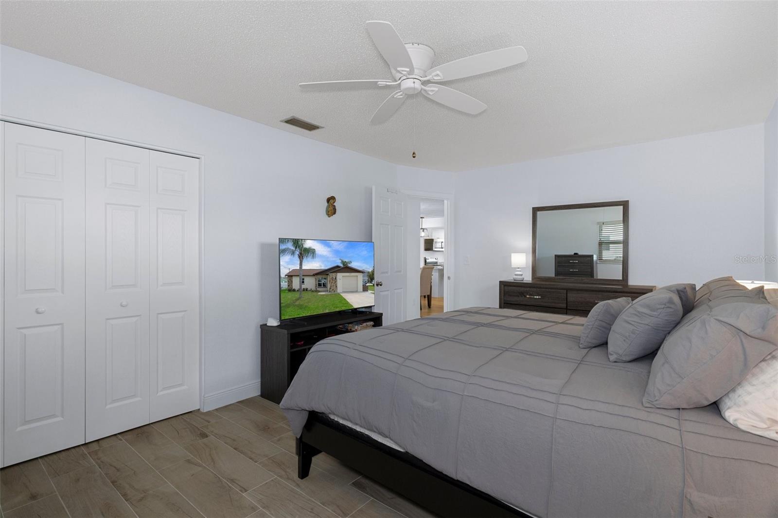 Bedroom 1with NEW Wood Look Tile Plank Flooring