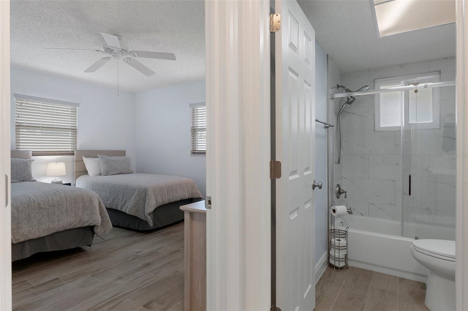 Bedroom 2 and Bath 2 with NEW Wood Look Tile Plank Flooring