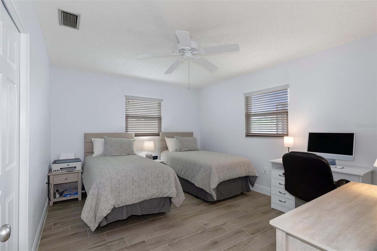 Bedroom 2 with NEW Wood Look Tile Plank Flooring
