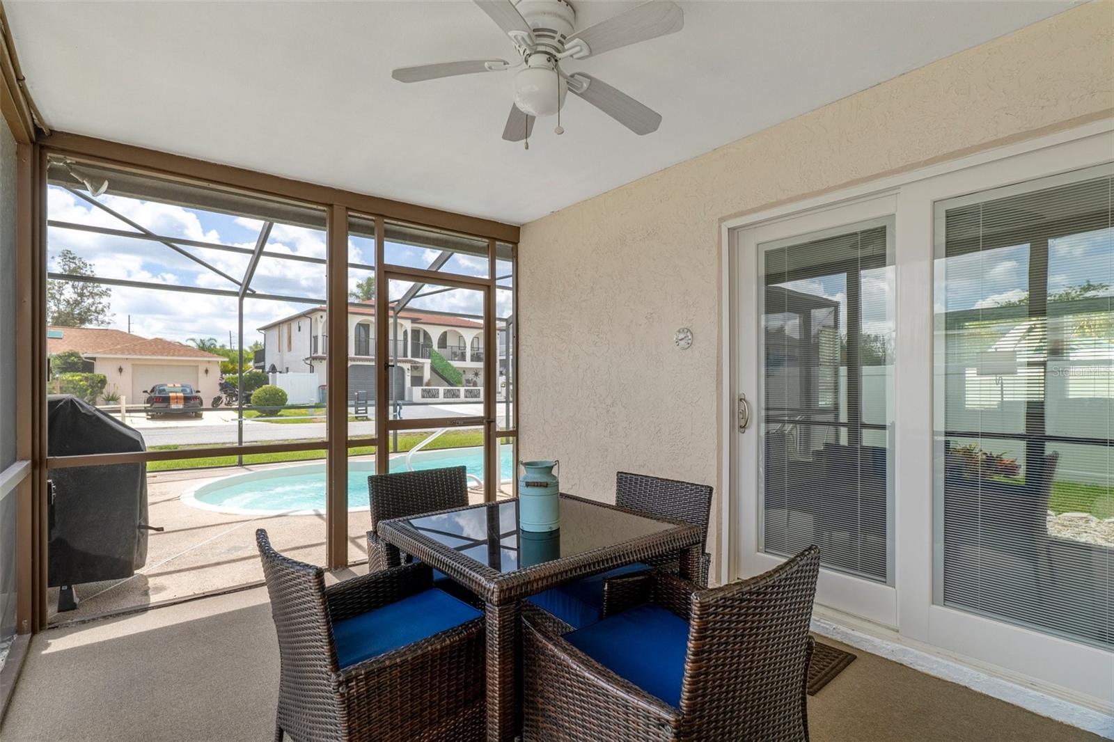 Screened Lanai with NEW Sliders and NEW Outdoor Carpeting