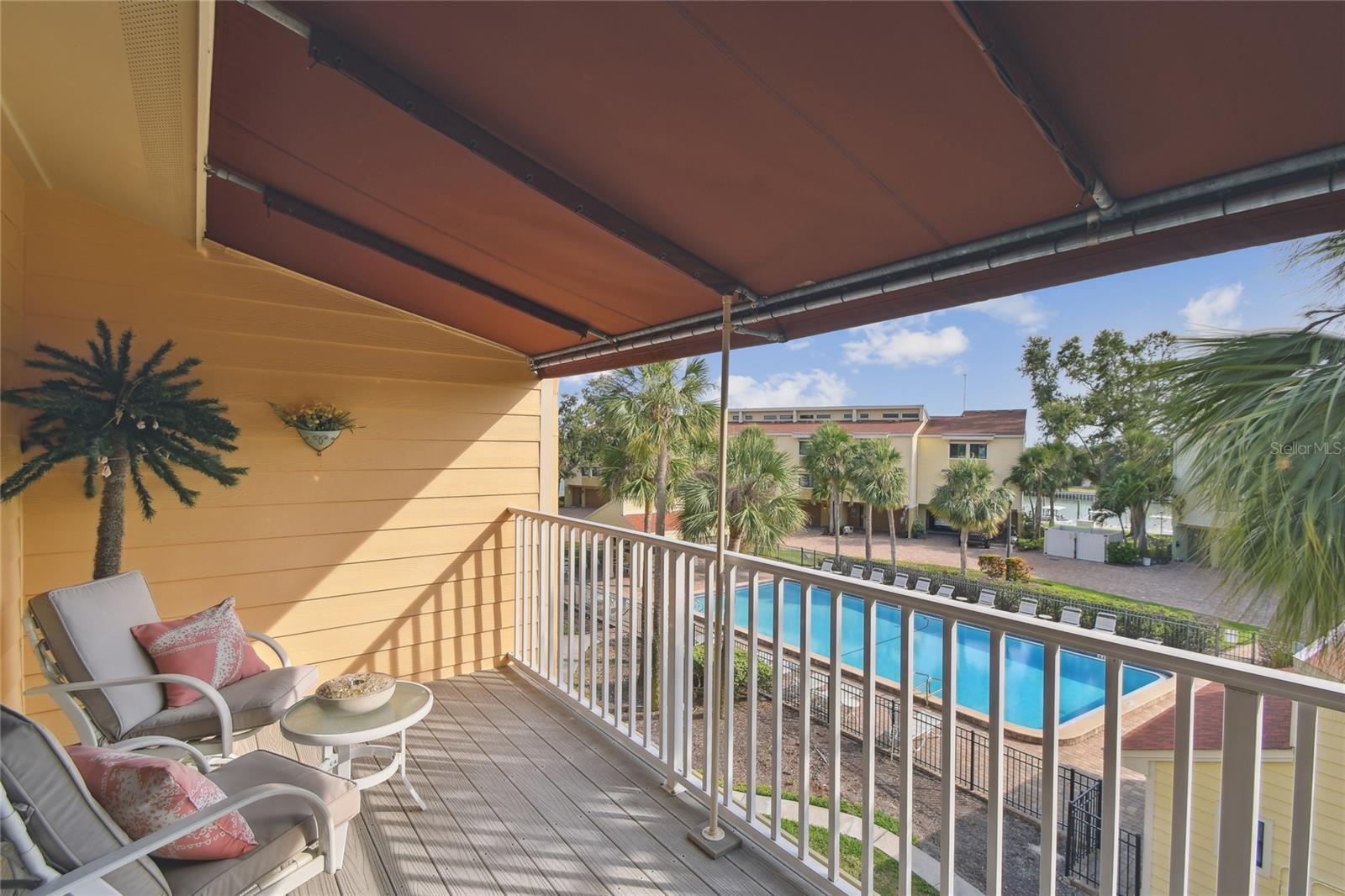 Relaxing tropical pool and ICW views from the Primary bedroom  balcony.