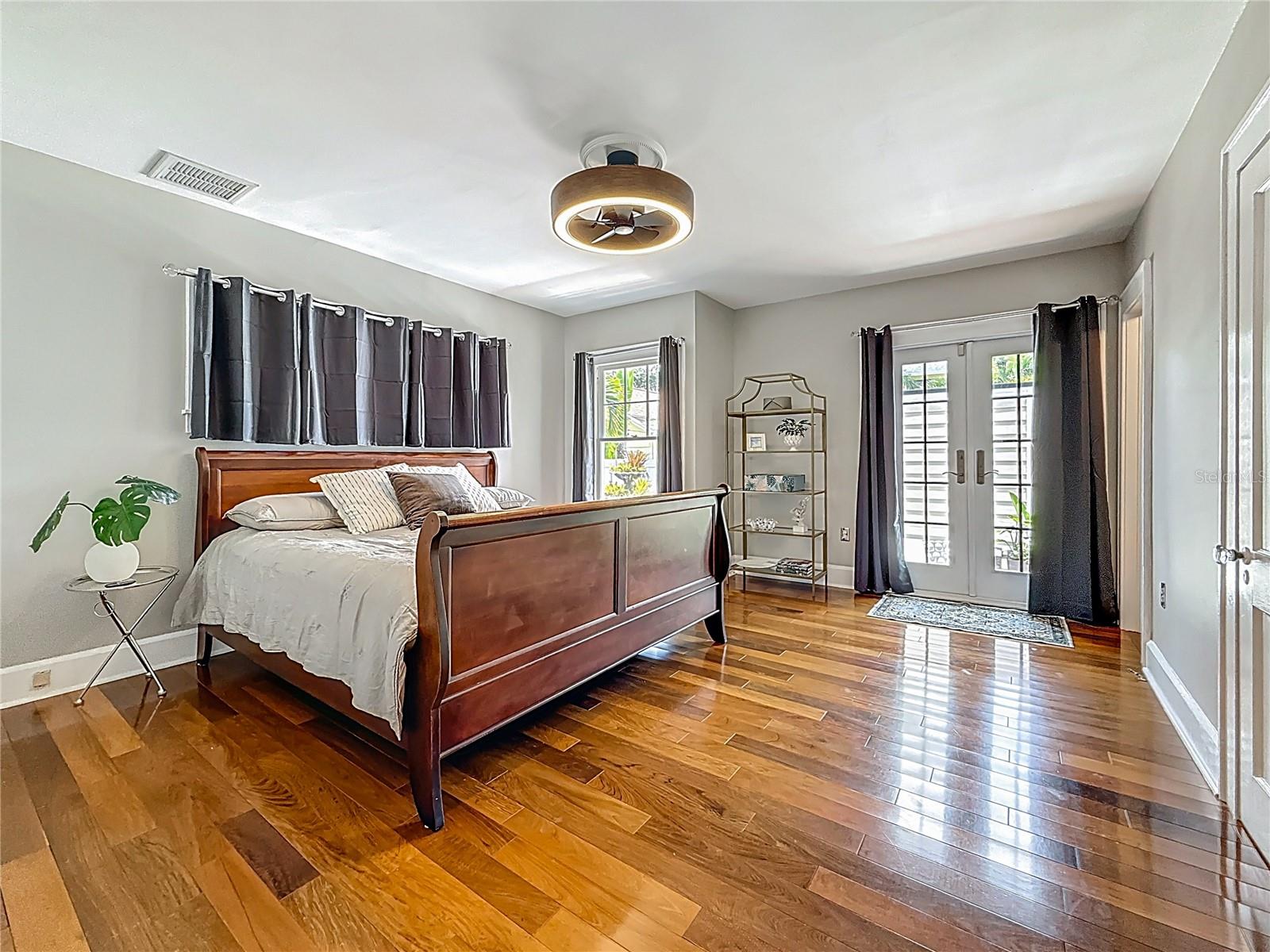 Master bedroom opens to backyard