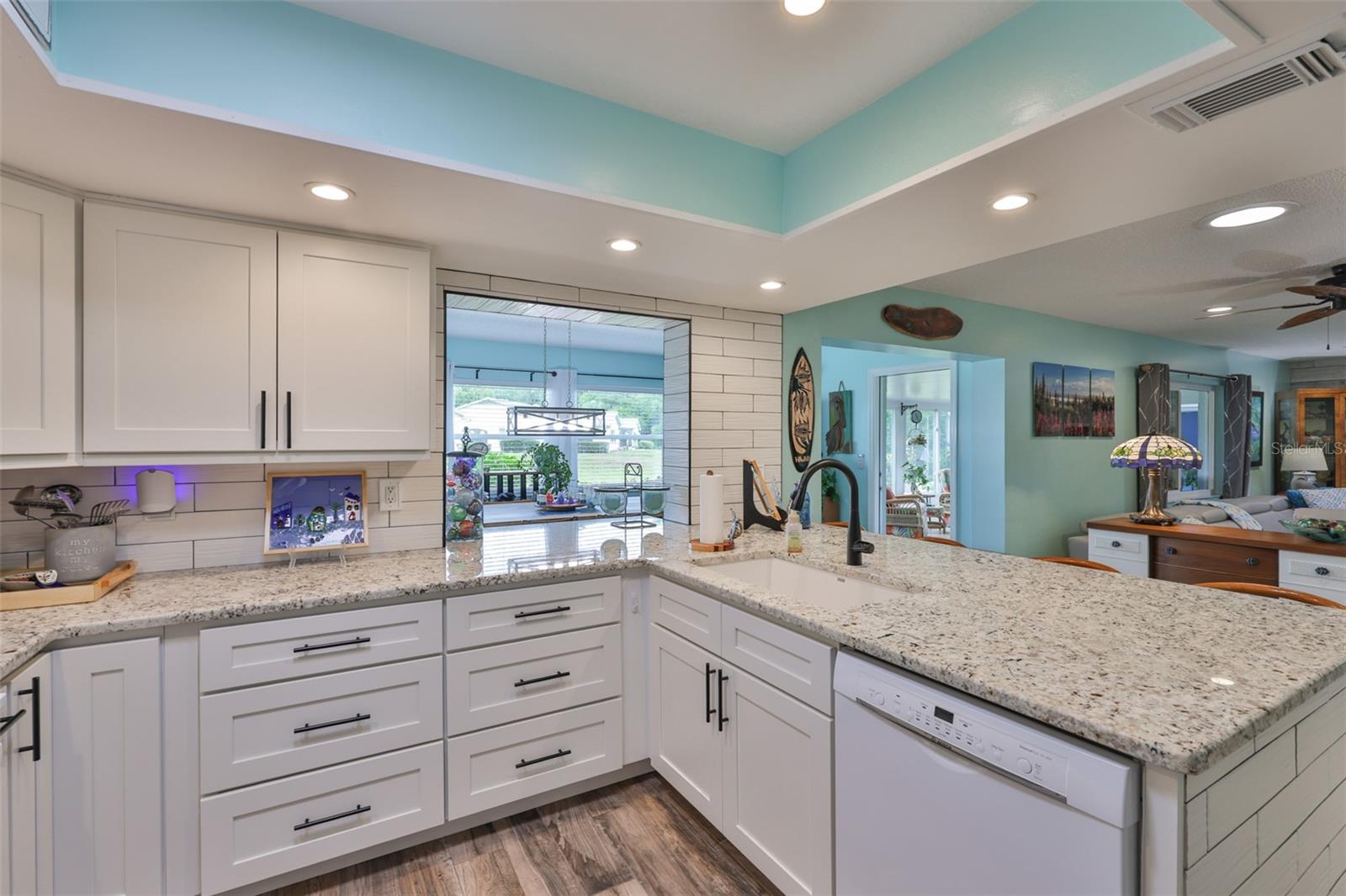 Granite Countertops, new tile backsplash, new tile flooring
