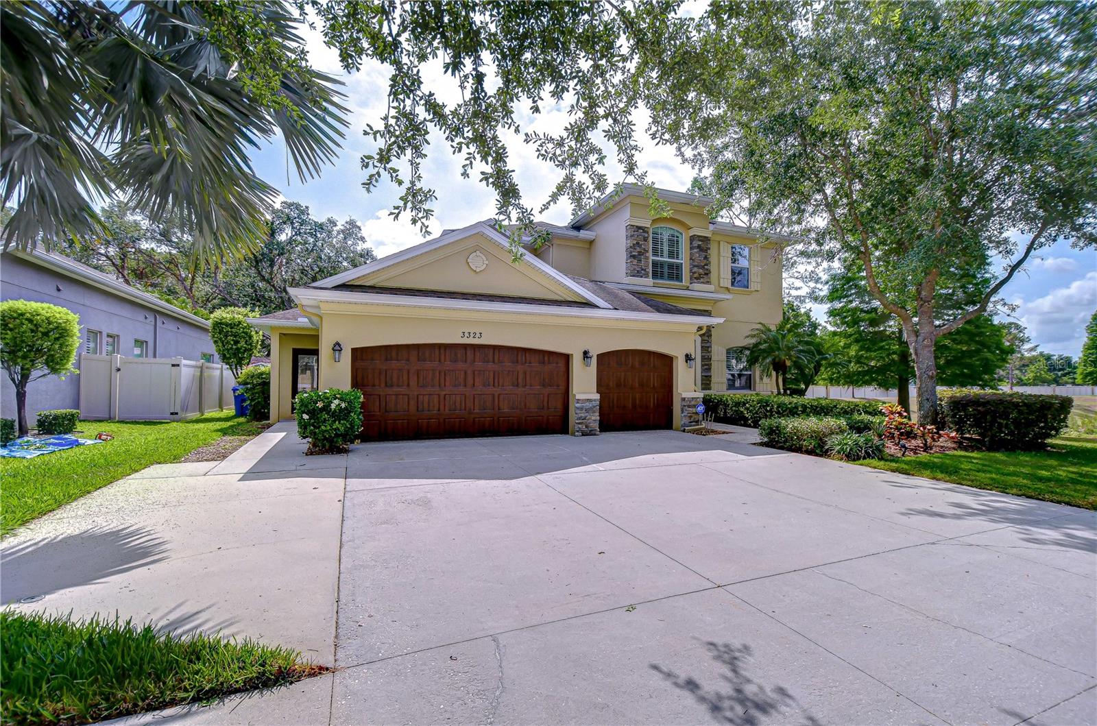 Spacious three car garage with additional storage shelfs!