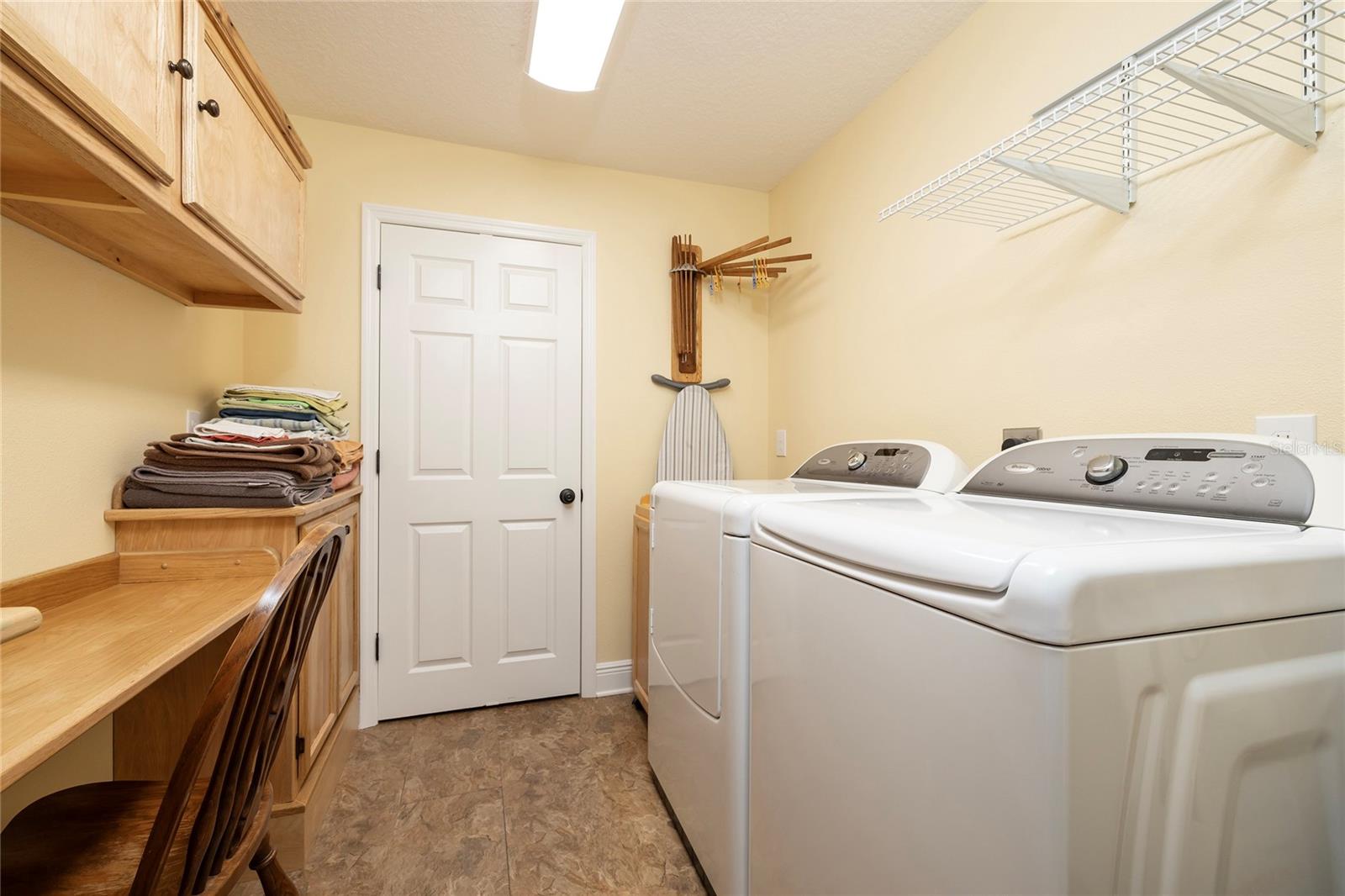 Inside Laundry with Storage Closet
