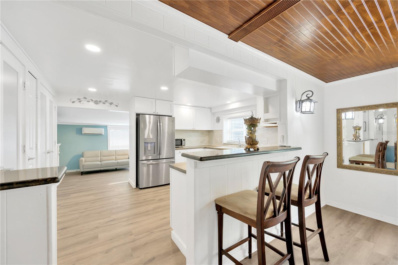 The Breakfast bar is topped with granite.