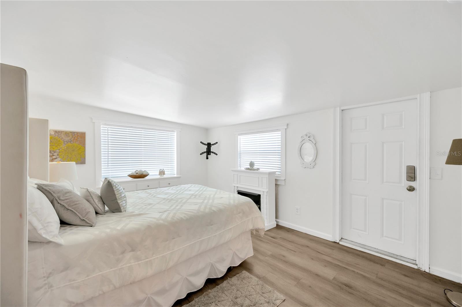 Bedroom #2 offers its own private exterior entrance from the driveway on the side of this home — ideal for an adult child, roommate or even a home office.