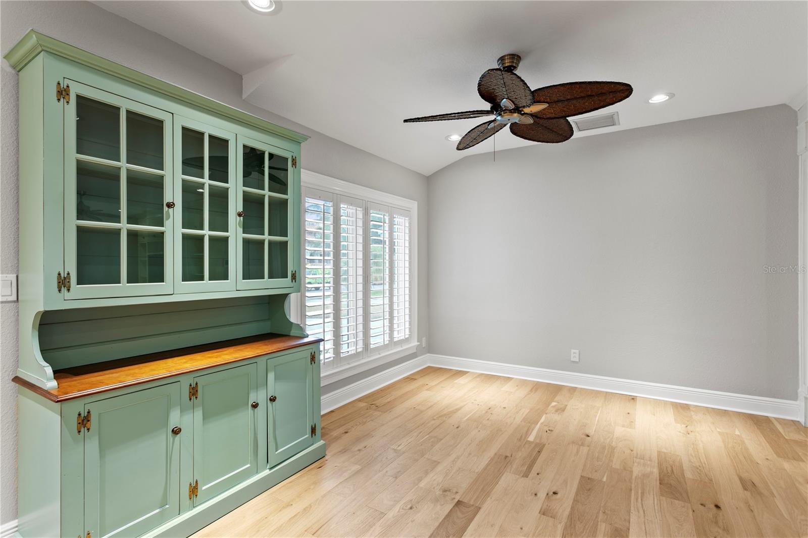Flexible kitchen layout provides room for a hutch, wet bar, or casual seating