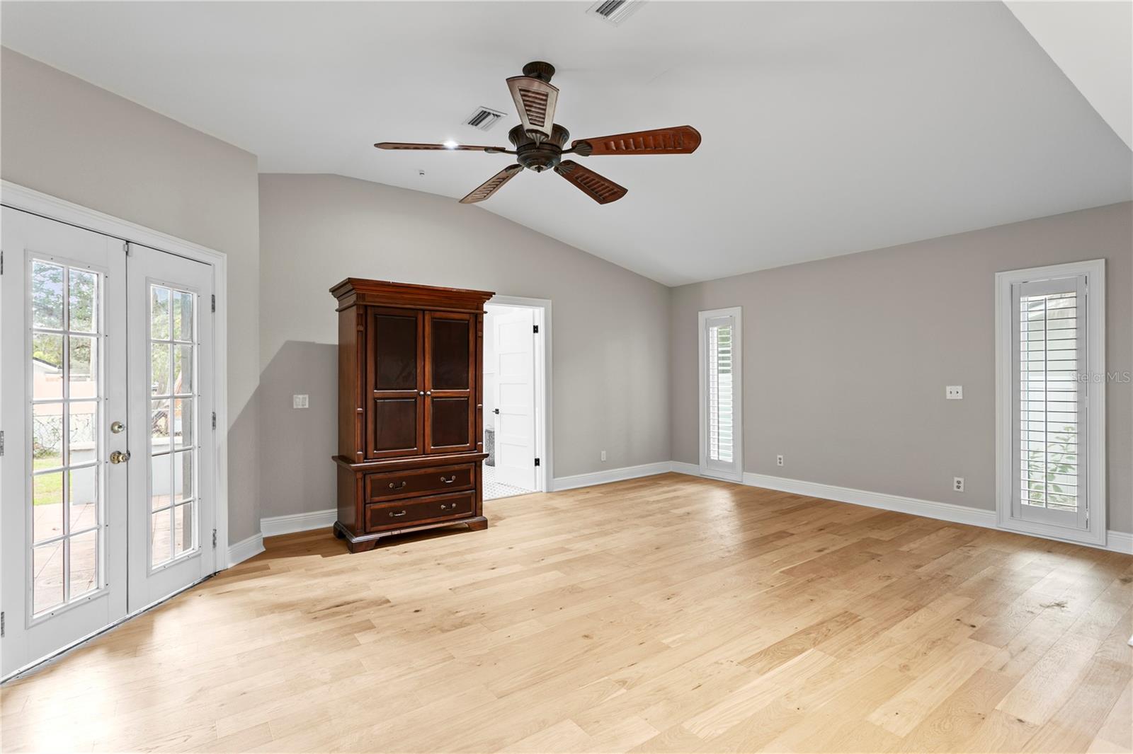 Retreat to the spacious primary suite