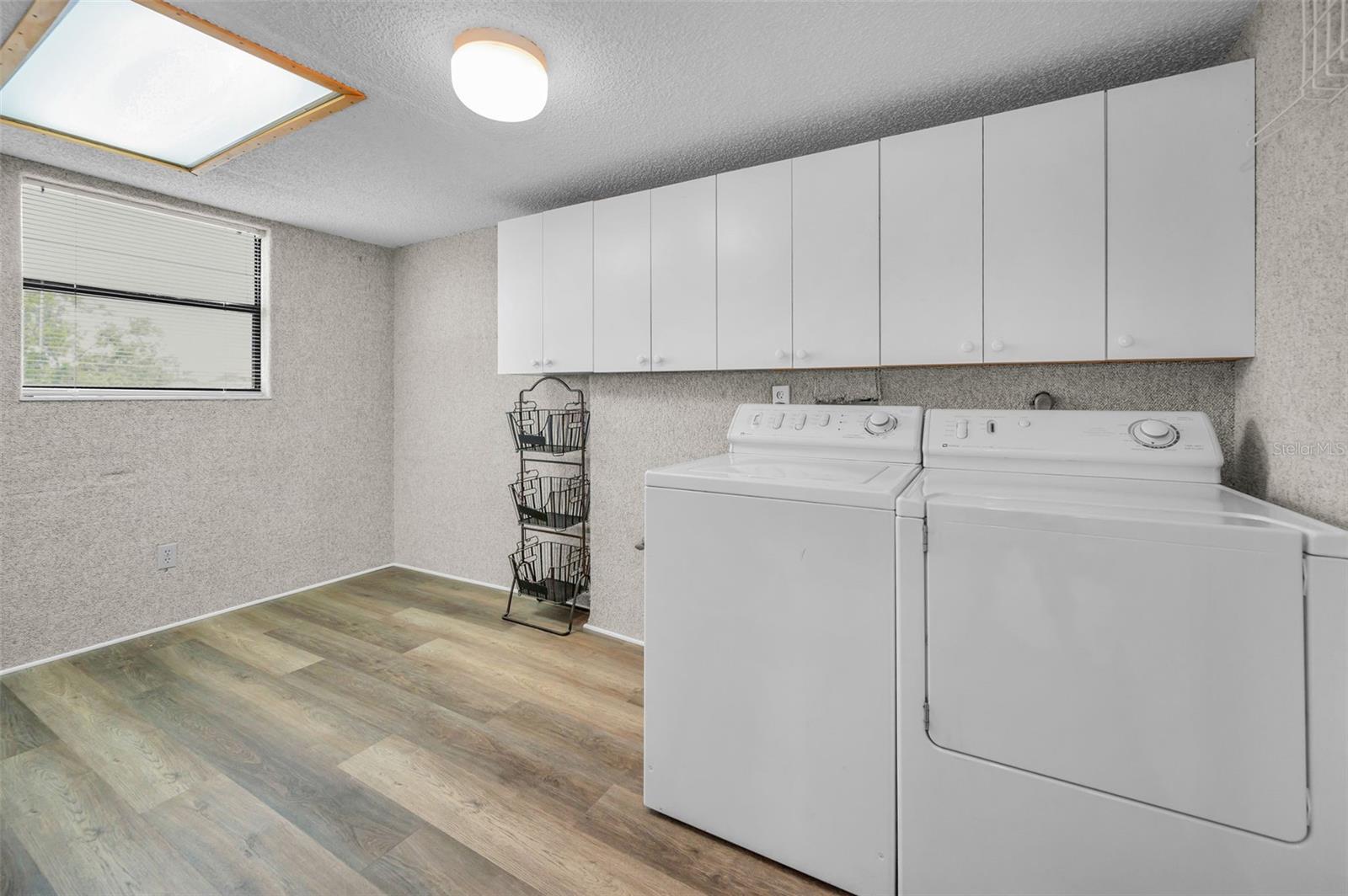 Oversized laundry room with so much space