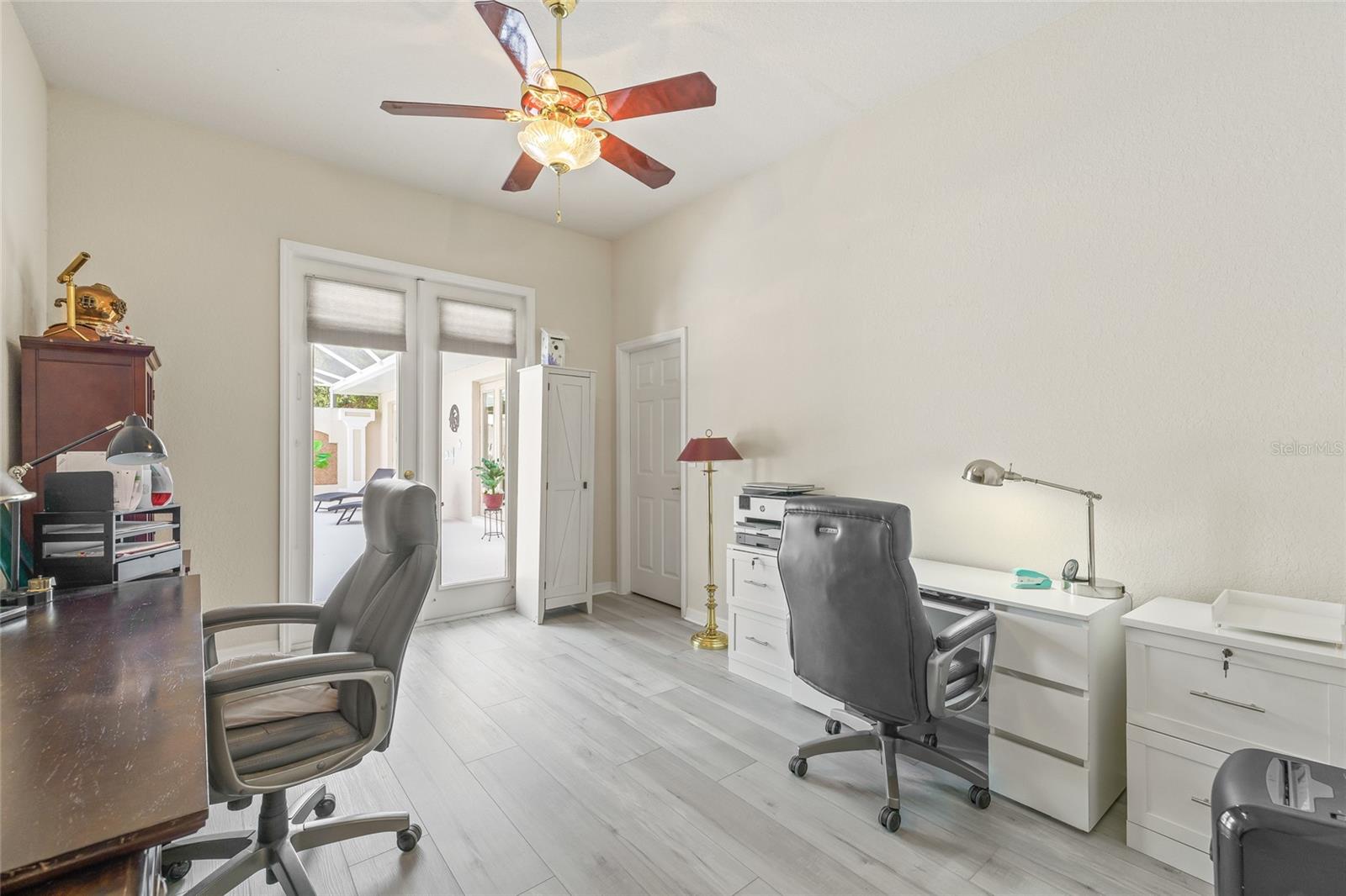 Office/Bedroom 3 w/ walk-in closet & access to pool
