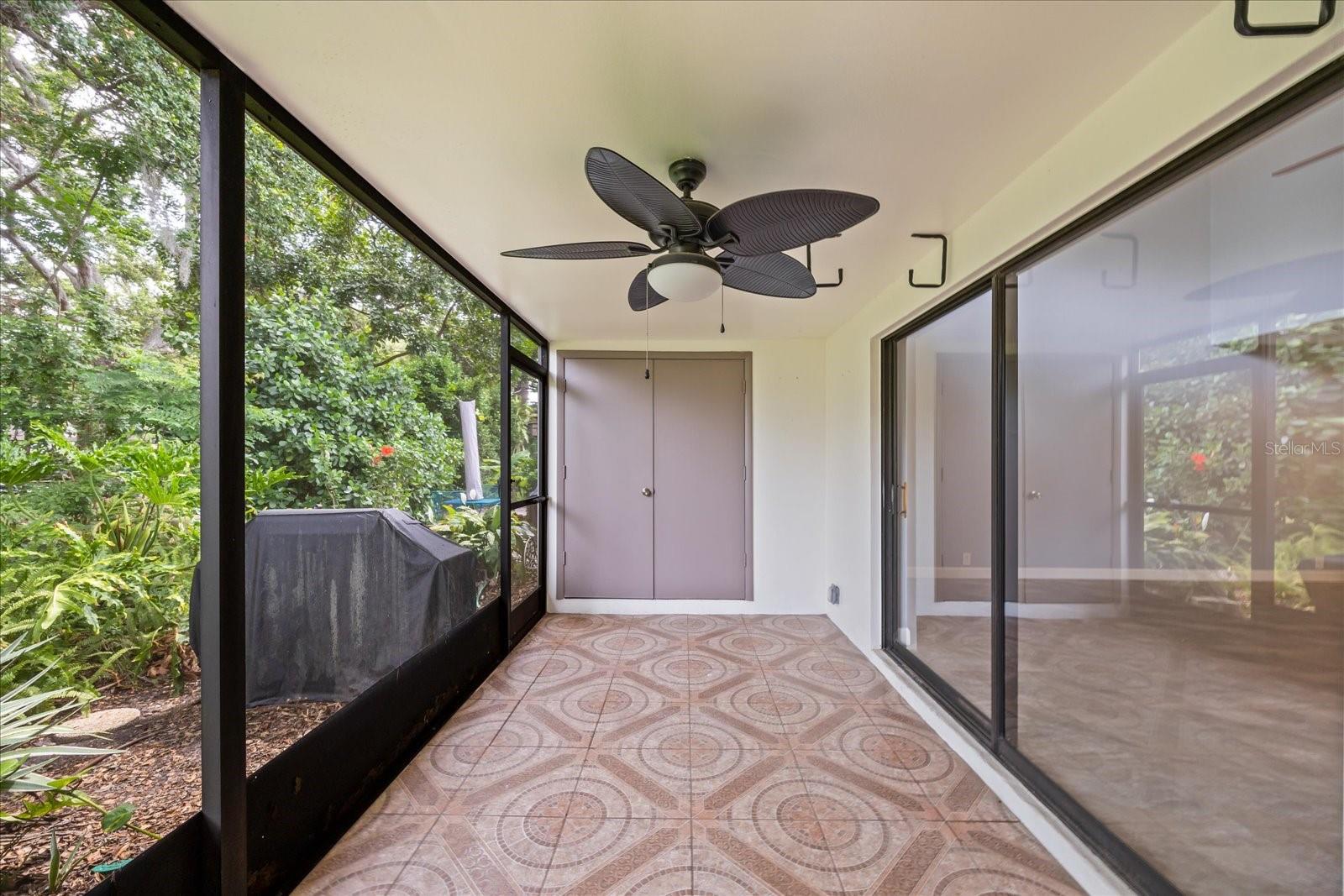 Screened rear porch with laundry closet