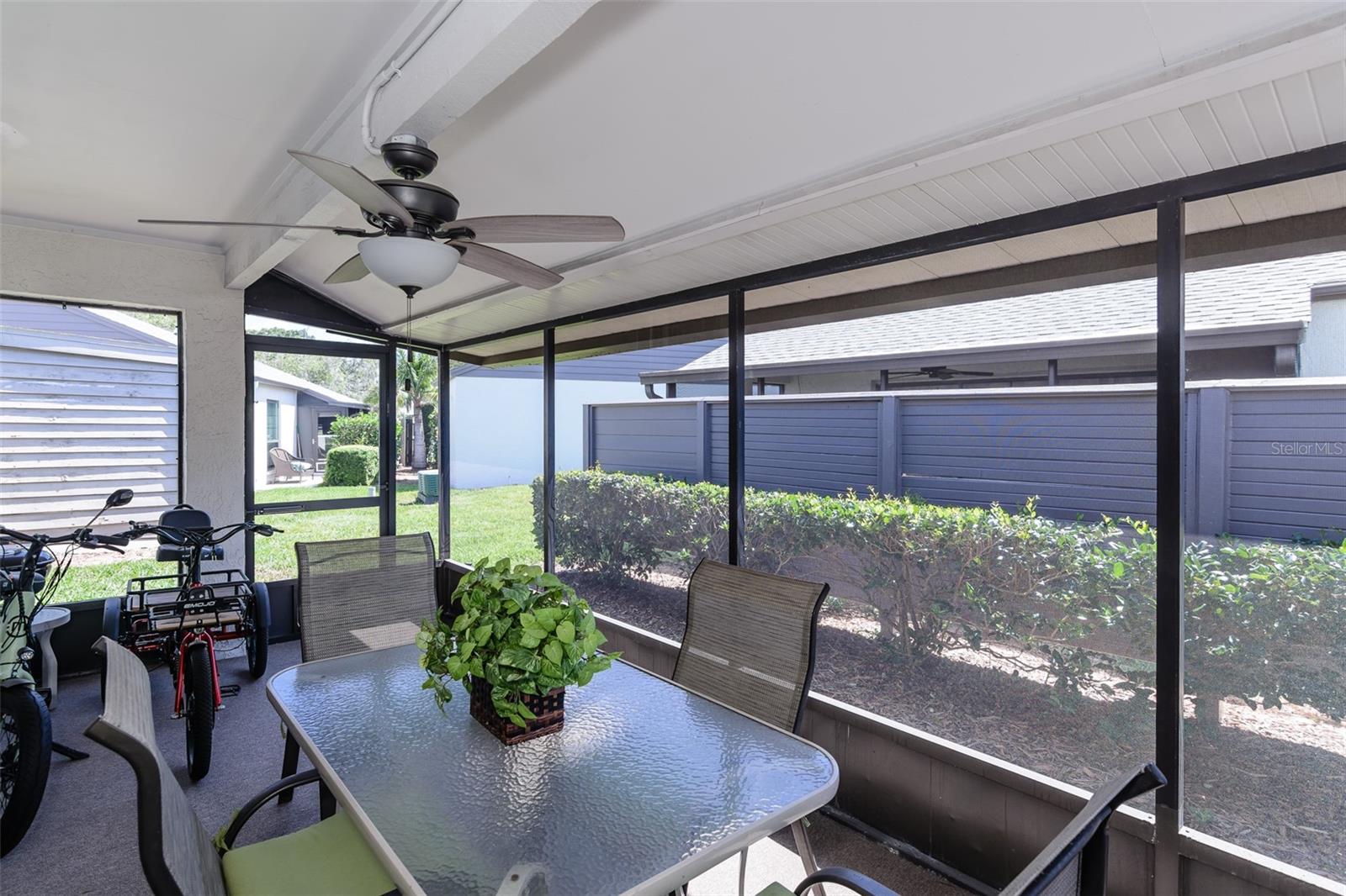 Private screened lanai. Condo Association maintains privacy fence.