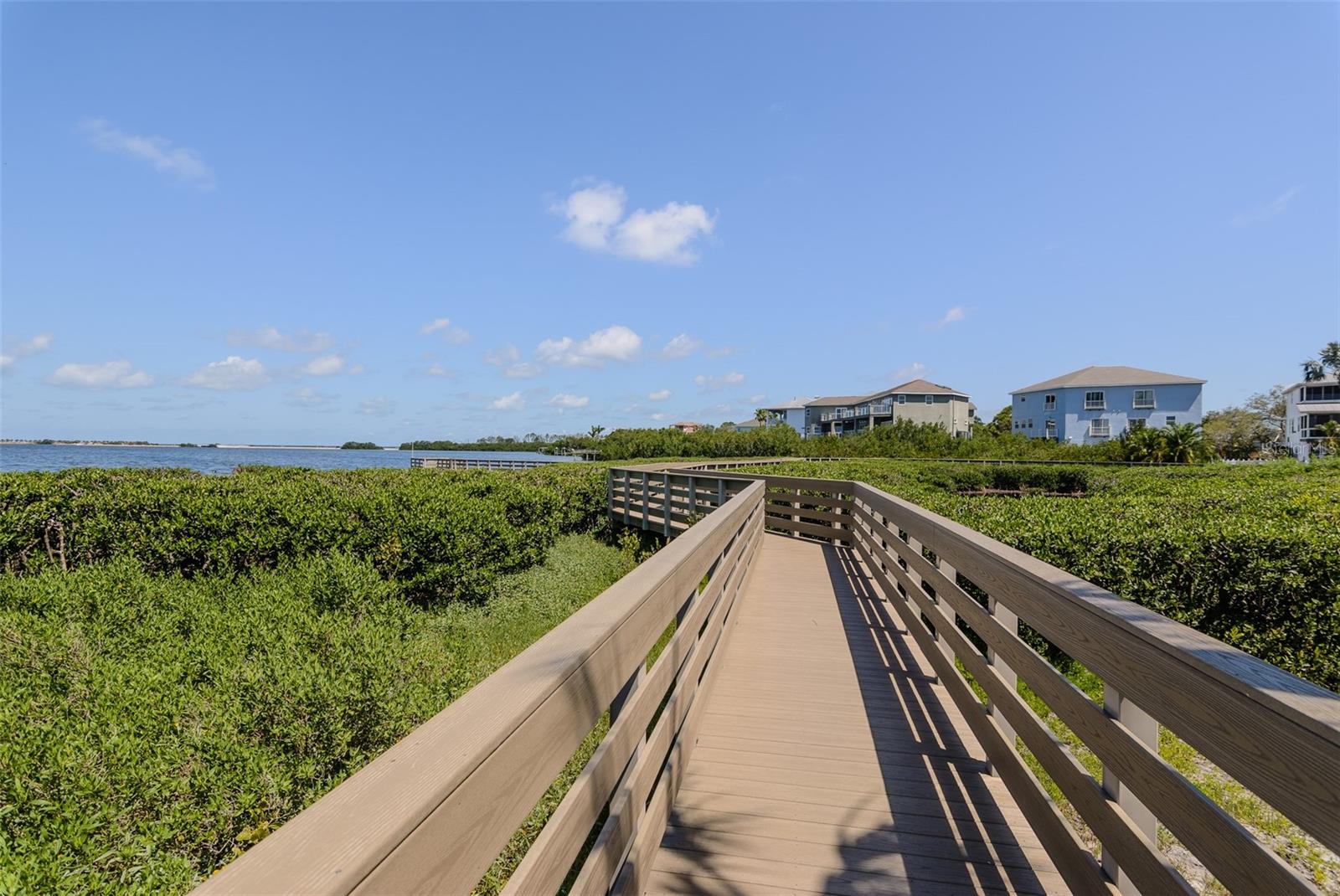 Waterfront boardwalk between community docks.