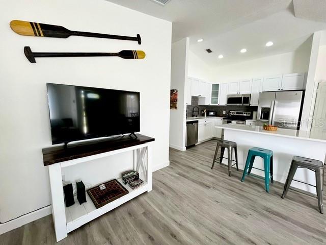 LIVING ROOM KITCHEN AT THE END