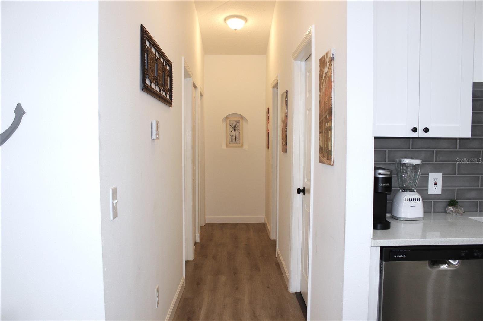 HALL TO BEDROOMS AND BATHROOMS
