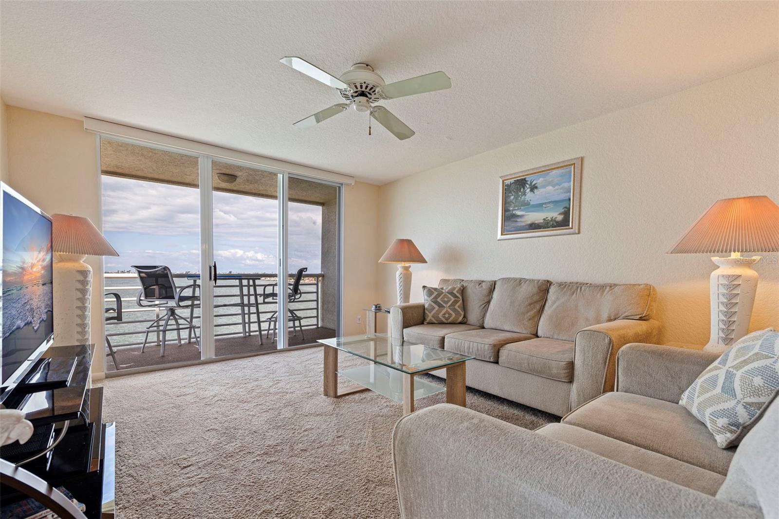 Seamless flow from living area to open water balcony