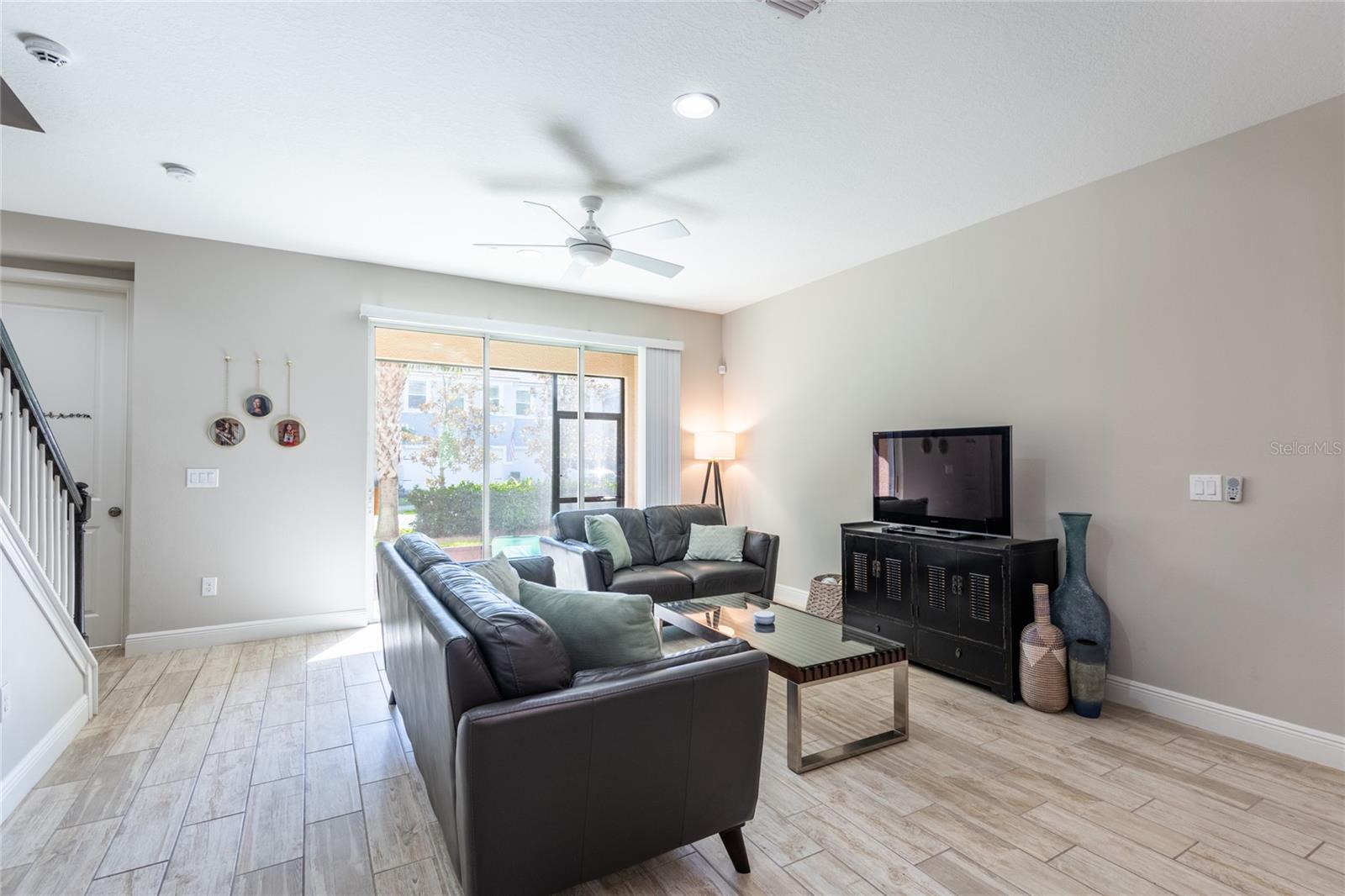 Large family room with access to the screened in lanai