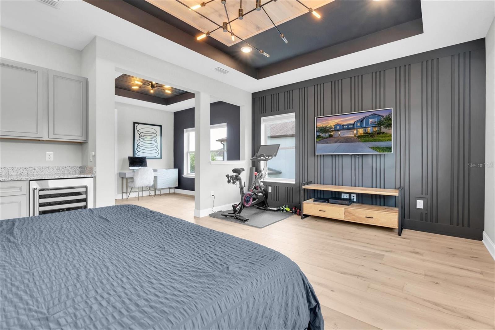 PRIMARY BEDROOM WITH HARDWOOD FLOORS