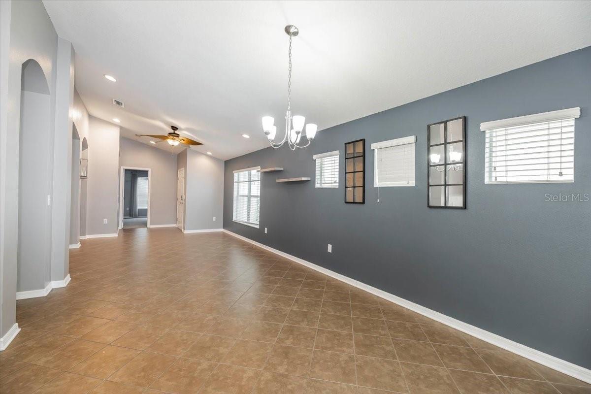 Dining room and living room combo looking towards front door