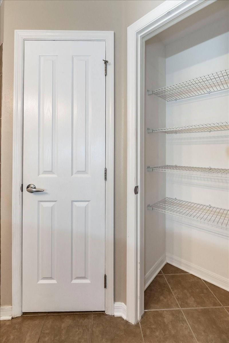 Primary en suite bath linen closet and water closet