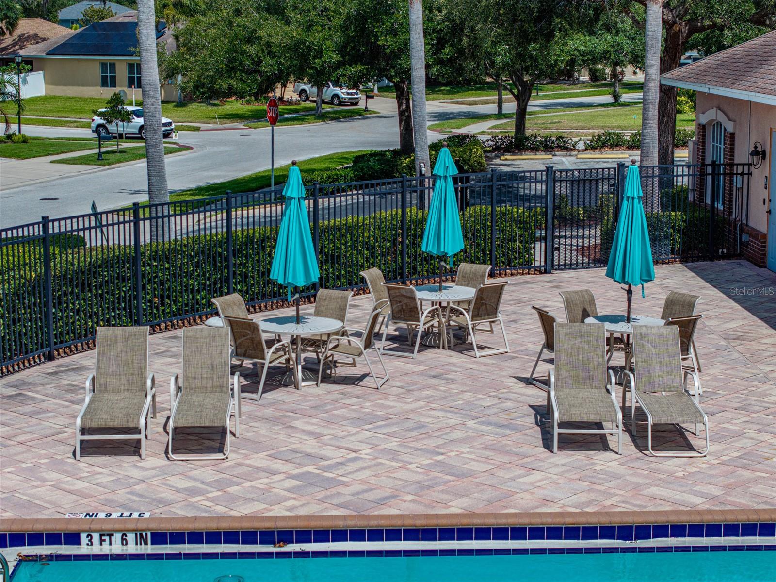 Community pool has Ample seating for everyone