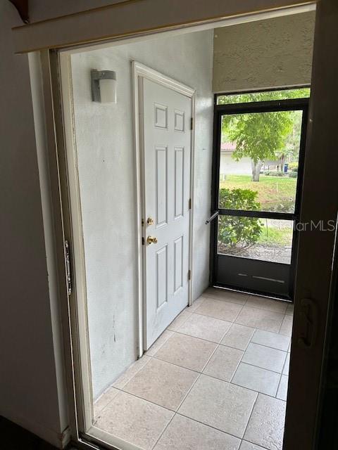Closet door to storage on porch