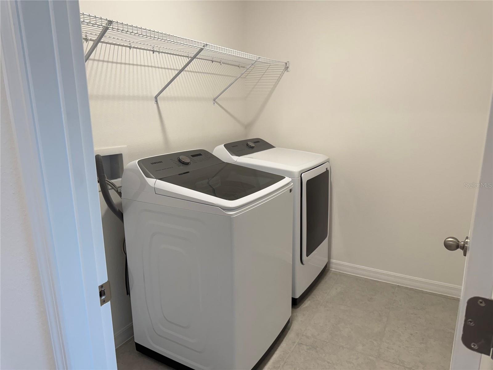 Upstairs laundry room with washer & dryer