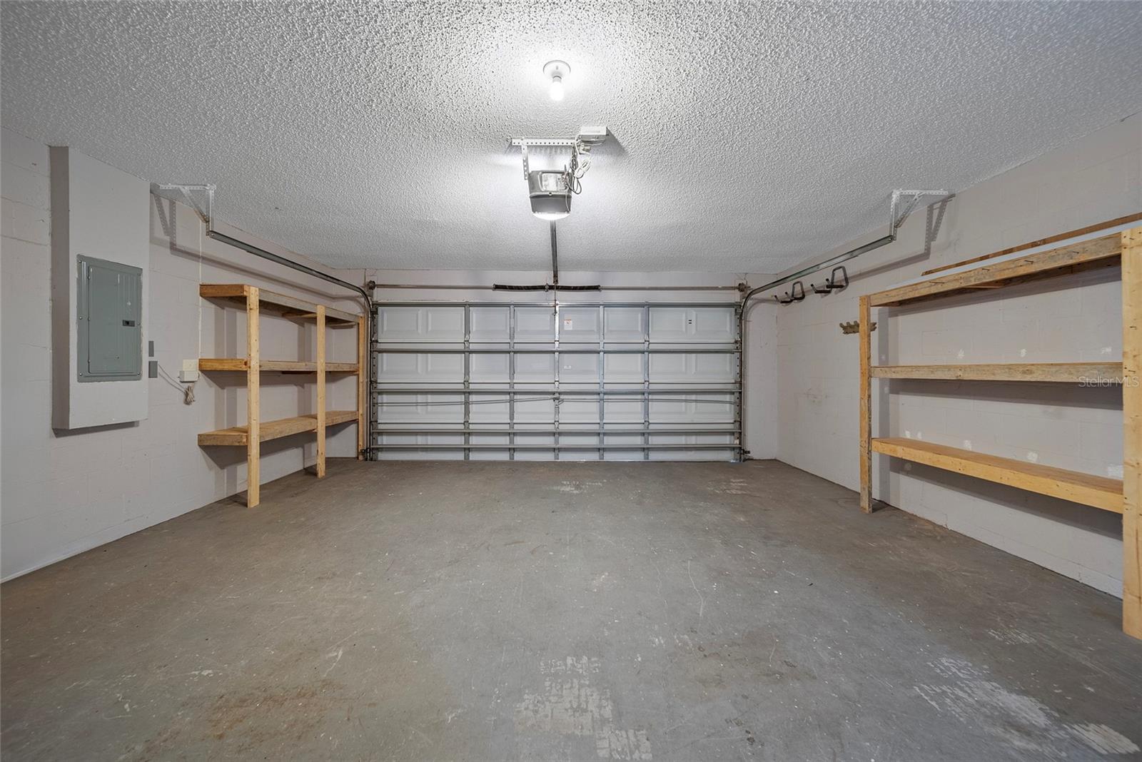 2-car garage with built-in shelving
