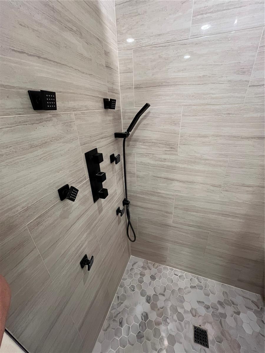 Multiple shower heads in master bath shower