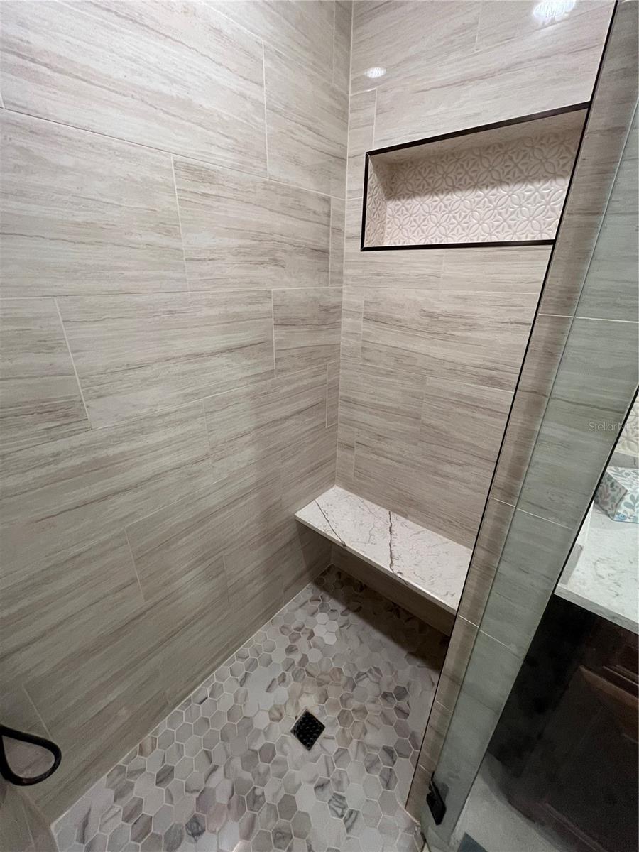 built in bench in master bath shower