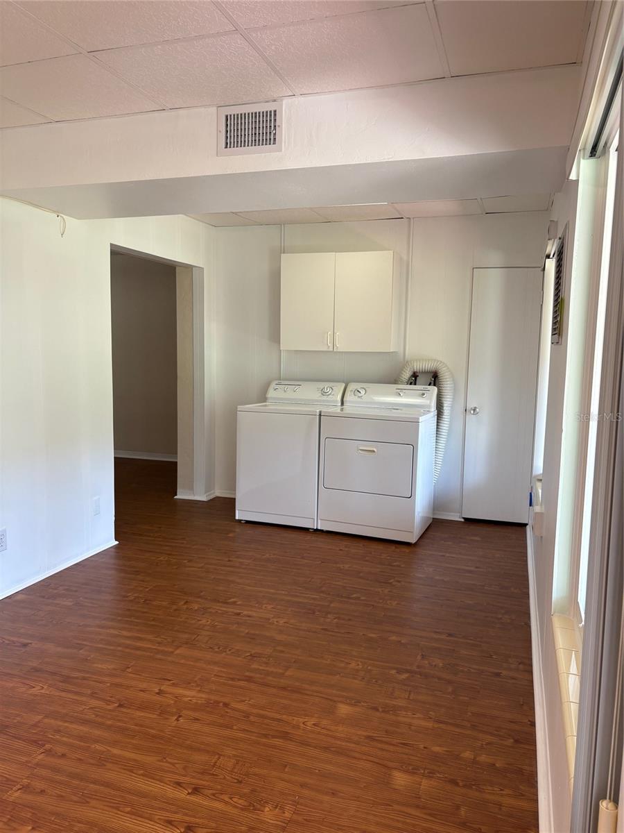 Full size washer and dryer in Florida room
