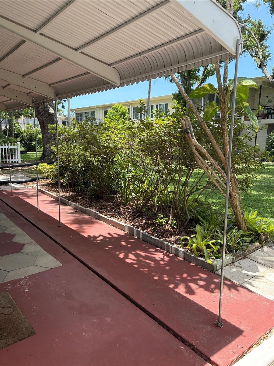 Covered patio with courtyard views