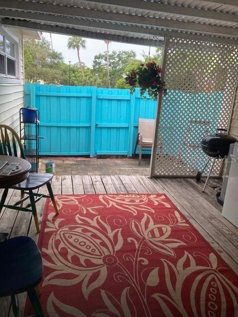 APT A Covered porch area fenced for privacy