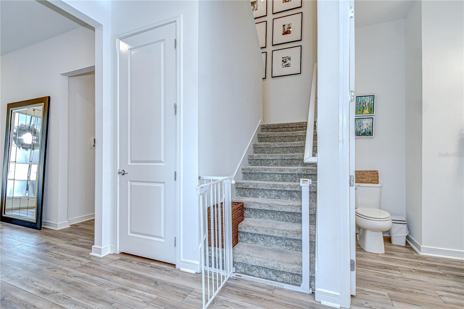 Storage room wraps under stairs!