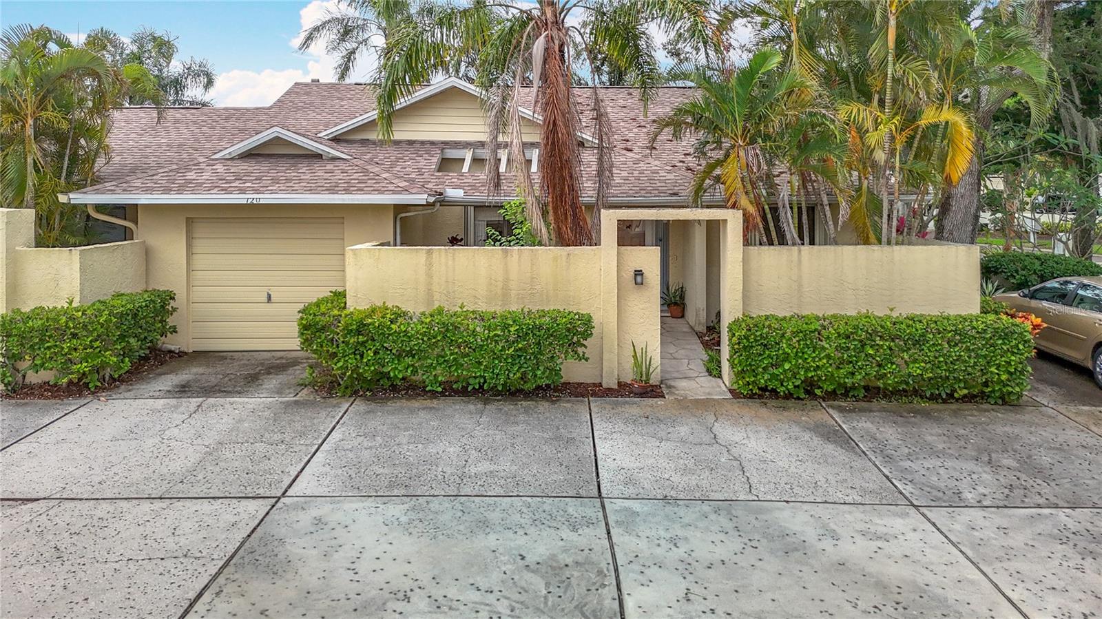 1 Car garage on left and extra parking spot on right