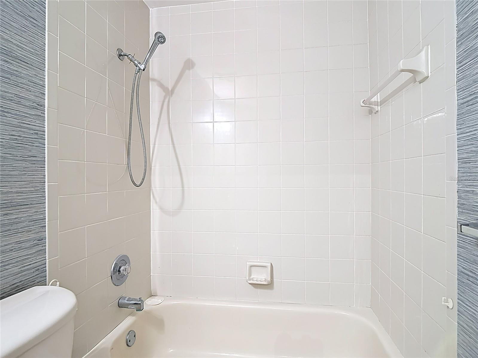 Guest Bathroom with tub/shower combo.