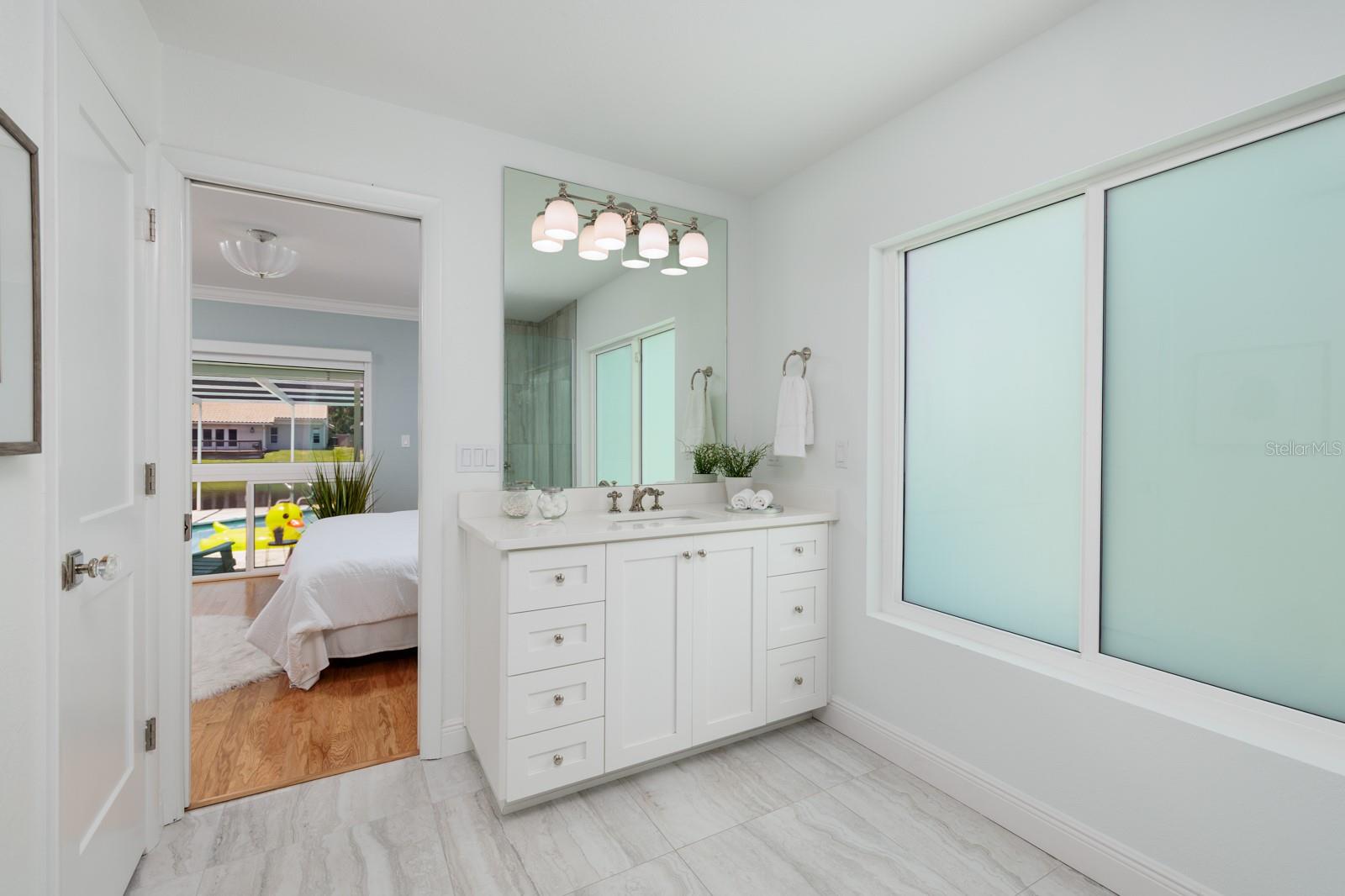 Lots of Natural Light and Closet Space in Your Luxury New Bathroom!