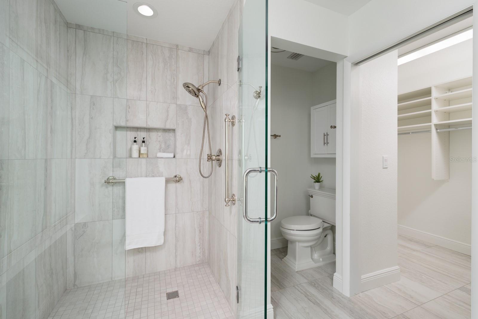 Private WC, Spacious Shower and Entrance to Master Closet.