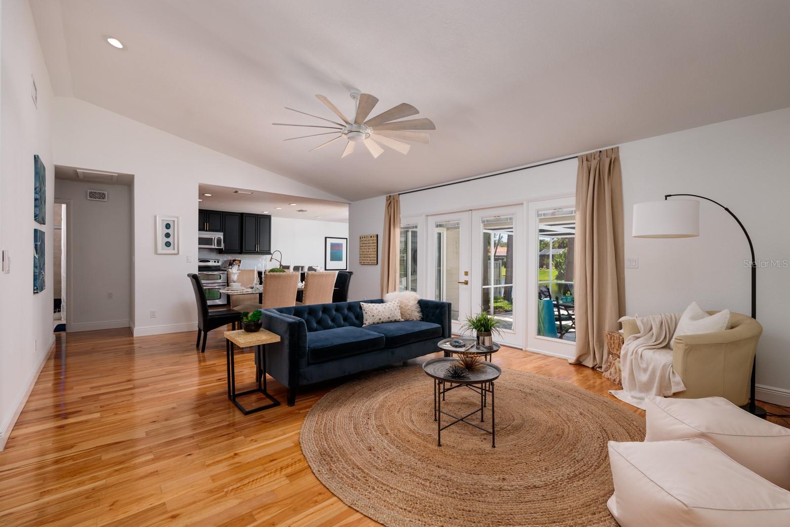 Flexible Living Spaces For How YOU Live! This shows Living Room/ Dining Area Combo into Kitchen!