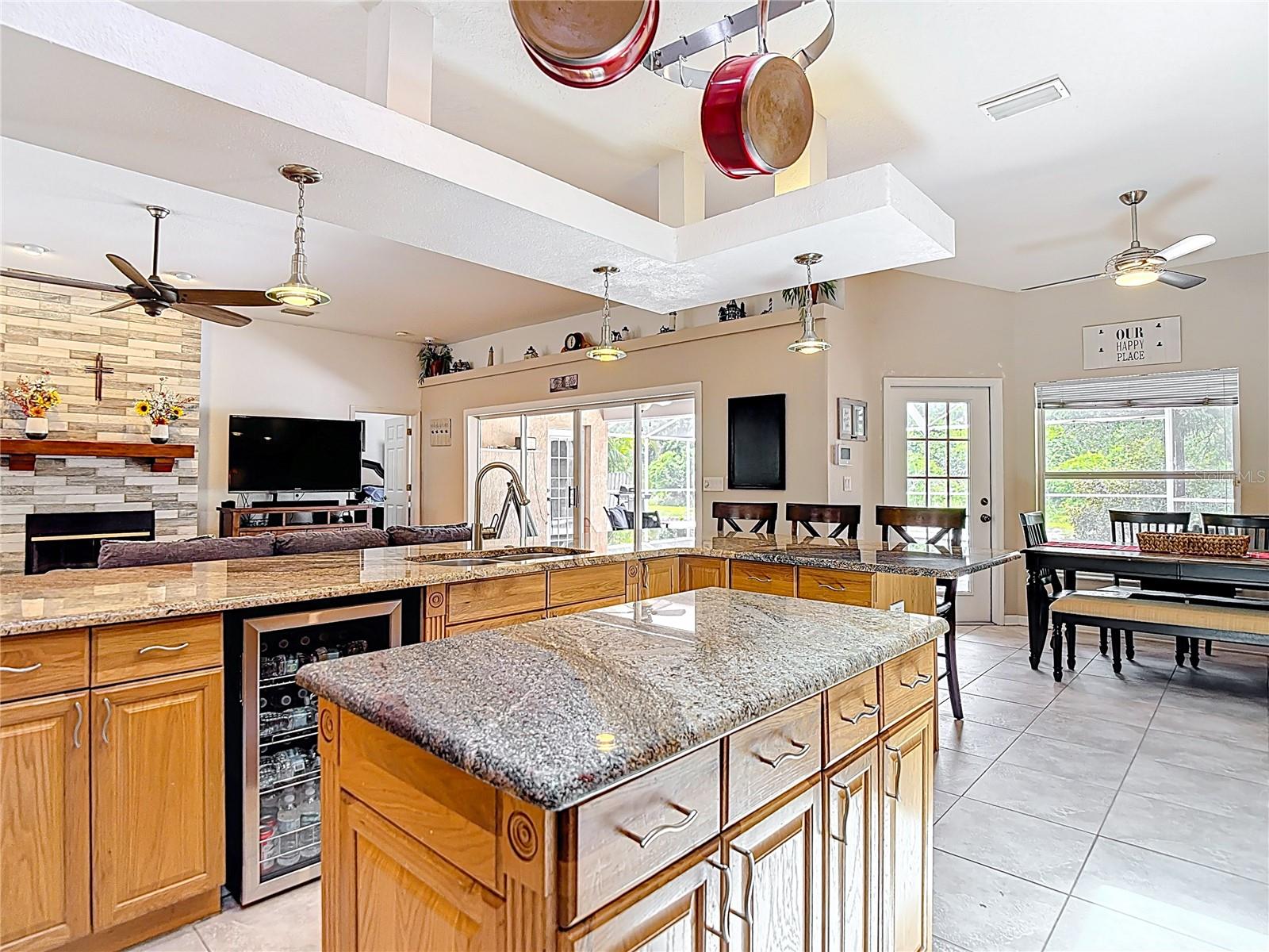 Kitchen - Casual Dining Area - Outdoor Living & Pool Area